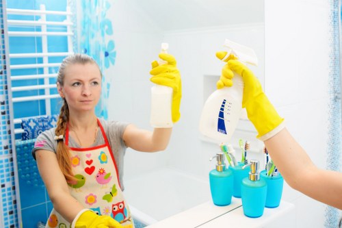 Carpet cleaning technician using safety equipment during a Wood Green job